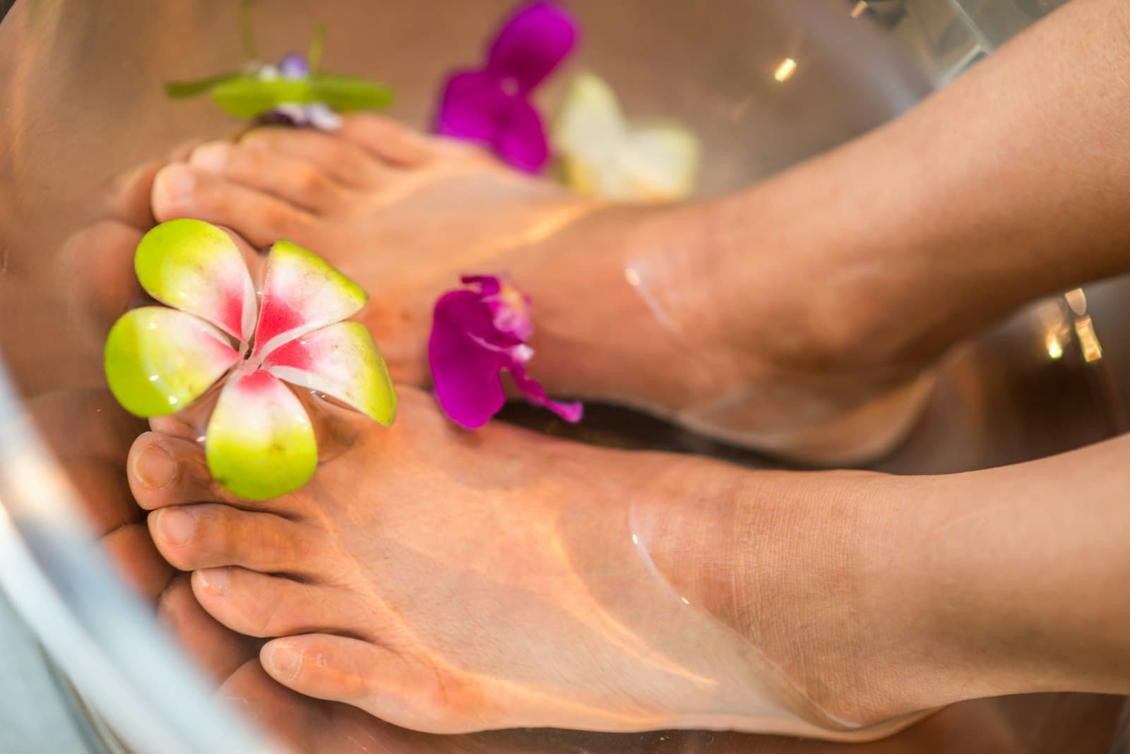 Professional providing foot care to a patient
